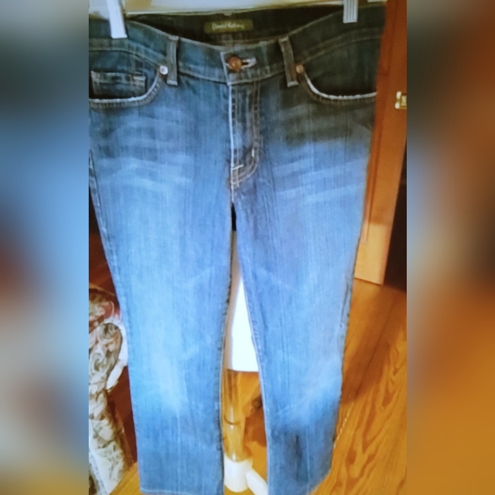 Pair of David Kahn women's bootcut med rise jeans. Size 4